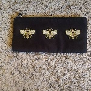 NWOT Papyrus black bee wristlet